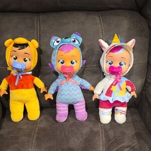 Adorable Trio of Baby Dolls with Pacifiers